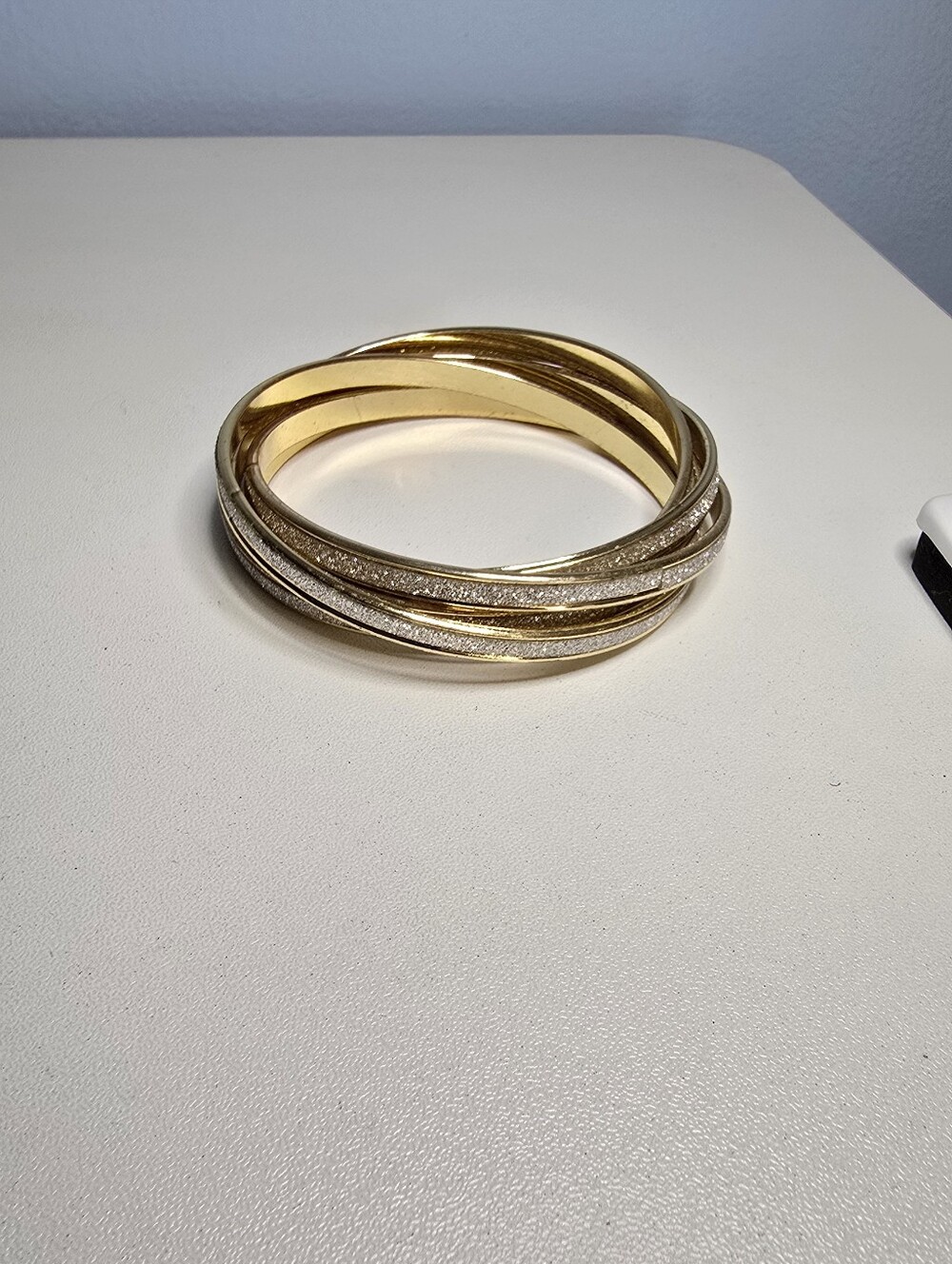 White Glitter Design Interlocking Goldtone Bangle Bracelets